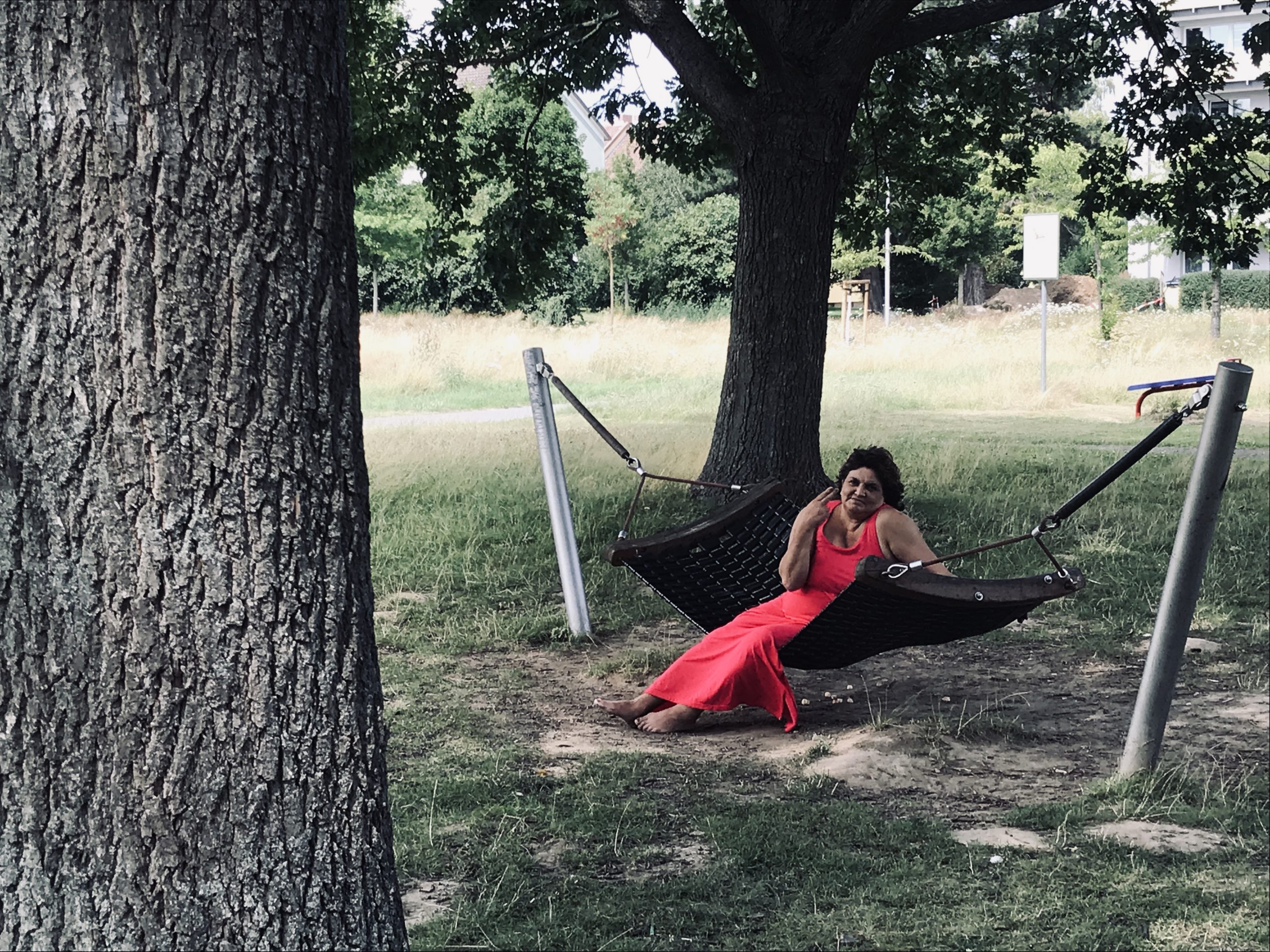 Woman relaxing on a hammock in Drispenstedt